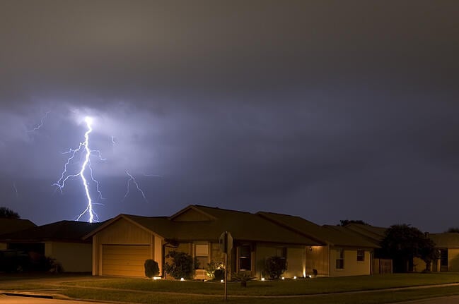 Lighting strike over home causing a neighborhood power outage