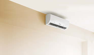 Ductless unit on high wall along ceiling