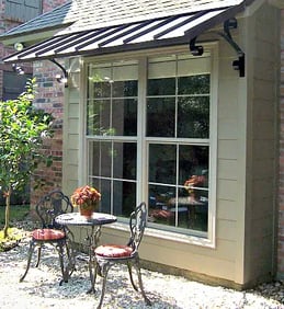 Window awnings help keep your home cool. 