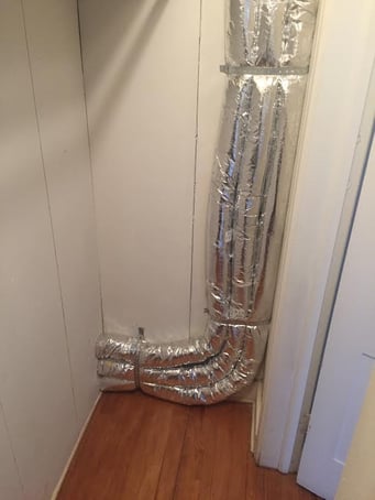 Unico High Velocity supply ducts hidden inside closet