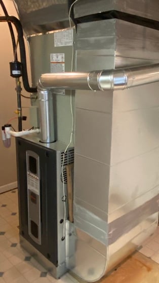 New Trane propane furnace installed in the basement of a Doylestown, PA home as backup heat for a dual-fuel heat pump system.