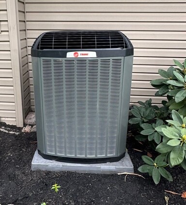 New Trane multi-stage outdoor air conditioner installed to replace the home’s aging R-22 cooling system.