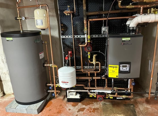 New Lochinvar boiler and indirect water heater installed in the basement.
