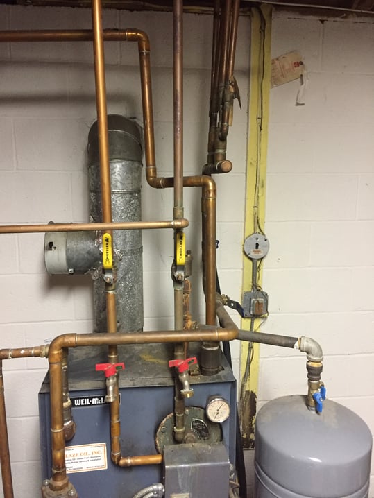 Their original Weil McLain boiler in Doylestown, PA shows a leak. 