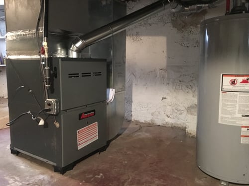 A two-stage variable speed motor Amana gas furnace installation inside of the Morrisville home