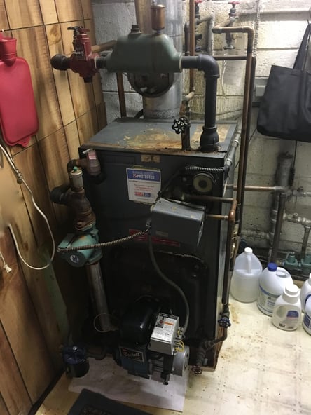 The old, cast-iron Weil-Mclain boiler in Bensalem before ECI installed a new boiler. 