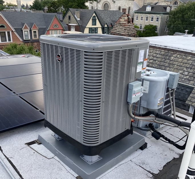 Ruud two-stage heat pump installed outside a home in Philadelphia, PA