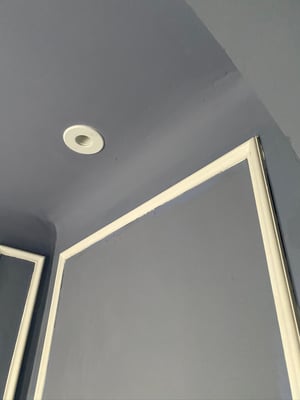 a high velocity unit installed in one of the corners of the ceiling of the master bedroom.