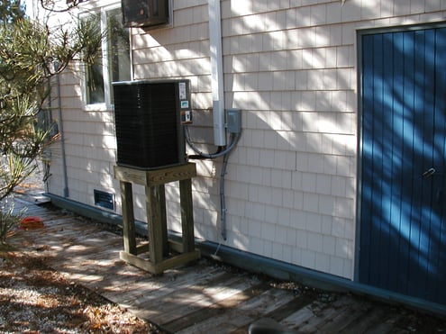 Outdoor unit mount installed outside Beach Haven home. 