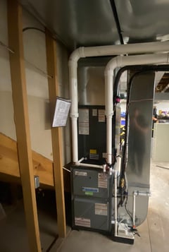 Heat pump vs oil furnace comparison showing energy efficiency in cold weather.