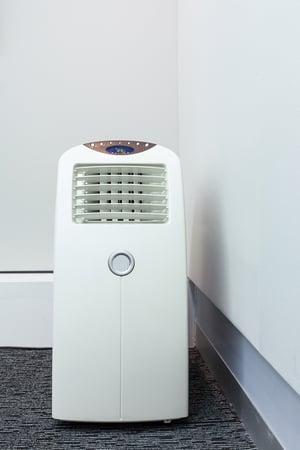 A space heater in the corner of a room is a temporary fix and does not have the strength of a central system. 