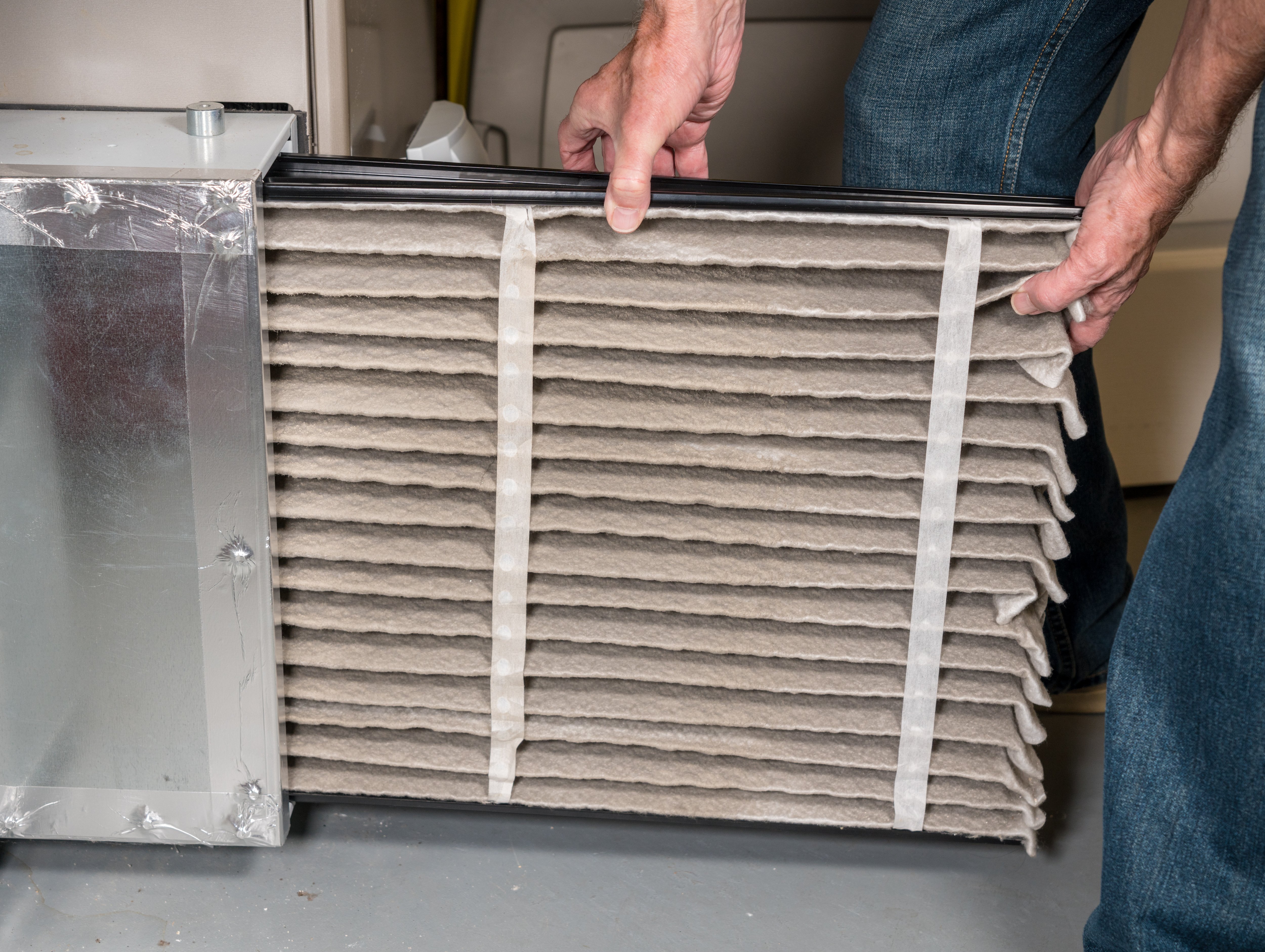Changing a dirty furnace filter