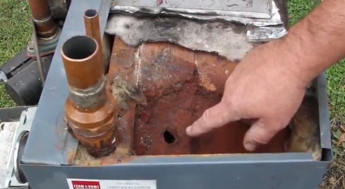 Corrosion in boiler causing water leak