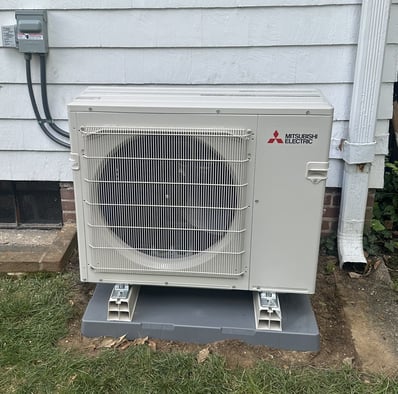 Mitsubishi Electric outdoor heat pump installed for a multi-zone mini-split system in Bucks County, PA