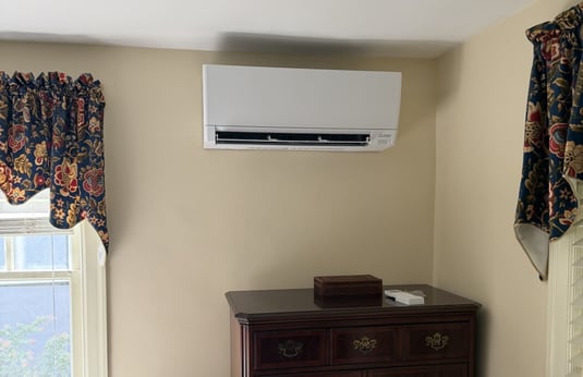 Mitsubishi mini-split indoor unit installed in the primary bedroom of a Bucks County, PA home.